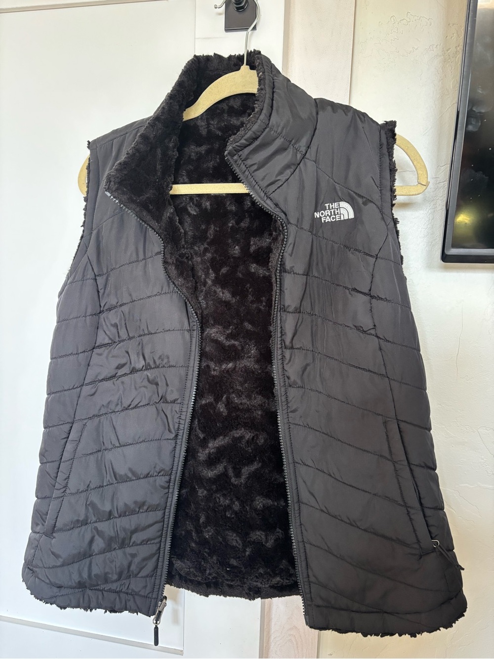 The North Face Women's Black Quilted Vest with Faux-Fur Lining